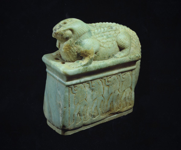 Green Stone Falcon-Headed Crocodile artifact showing falcon-headed crocodile with four worshiping baboons